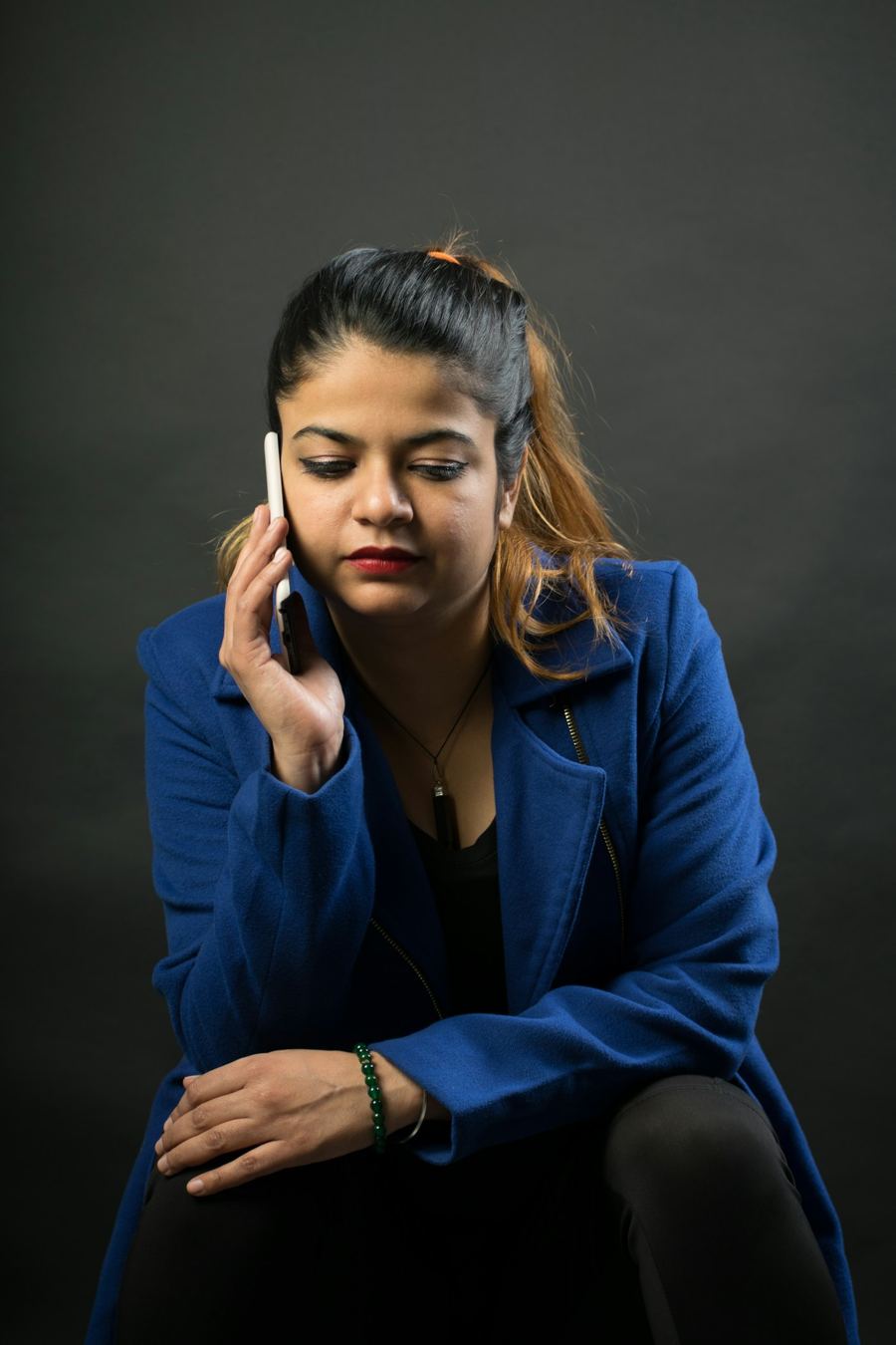A business owner taking a customer call